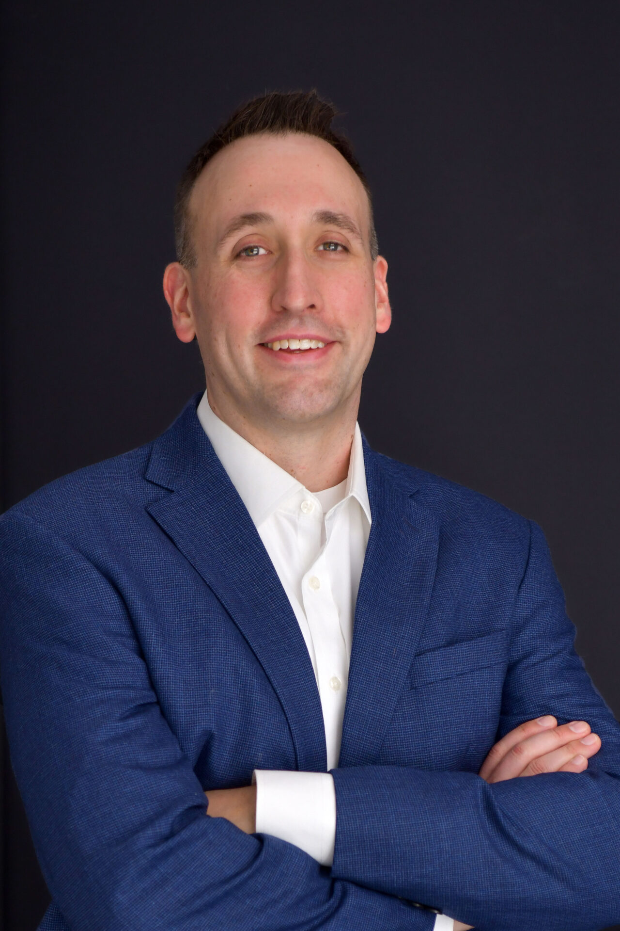 john with arms folded for home page